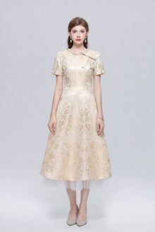 Metallic Jacquard Midi Dress with Pearl Bow Neckline and Tulle Hem